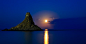 Rock Formation on Sea during Dawn