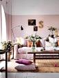 soft pink walls, skirted sofa, layered look