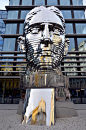 【互动雕塑】【国外美陈】艺术家David Cerny在布拉格打造42层卡夫卡旋转头像 - 美陈前沿网