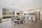 Inspiration for a large contemporary porcelain tile and gray floor great room remodel in Sydney with white walls and no fireplace