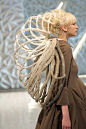 Wearable Sculpture - earthy, architectural fashion design with a 3D cage-like, hollow structure - fashion as art