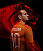 Wesley Sneijder models the Dutch home shirt with type insired by Wim Crouwel  