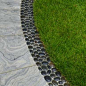 River Rock Mosaic: http://www.bobvila.com : This gracious polished stone mosaic creates a sleek transition from walkway to grass. While it’s a custom treatment with a custom look, it’s one that any industrious DIYer could accomplish as well.: 
