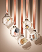Beauty products in clear ornaments. Photo by still life photographer Ian Oliver Walsh.: