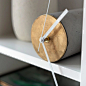 Tangent self-balancing shelf clock