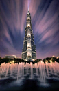 哈利法塔（Burj Khalifa Tower）原名迪拜塔（Burj Dubai），又称迪拜大厦或比斯迪拜塔，是位于阿拉伯联合酋长国迪拜的一栋已经建成的摩天大楼，有160层，总高828米，比台北101足足高出320米。迪拜塔由韩国三星公司负责营造，2004年9月21日开始动工，2010年1月4日竣工启用，同时正式更名哈利法塔。