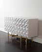 White modern petal design with bronze finish stand. John-Richard Collection Barrington Console: 