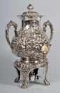 Gorham sterling repousse hot water urn & stand

描述：dated 1873, 16 in. H., 85.70 ozt.Condition Report: Monogram "M."
