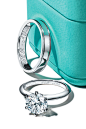 The Tiffany® Setting engagement ring and band ring with custom engraving. #Tiffany #TiffanyEngagementRings #TiffanyDiamonds #Sustainability #ResponsiblySourced #DiamondEngagementRing #RoundDiamond #RoundBrilliant #DiamondRing #TiffanySetting #TiffanyCusto