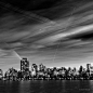 Manhattan Skylines 
Image Credit & Copyright: Stan Honda
Explanation: City lights shine along the upper east side of Manahattan in this dramatic urban night skyscape from February 13. Composed from a series of digital exposures, the monochrome image i
