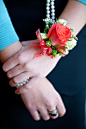 Coral and turquoise wedding with coral Amsterdam rose, spray roses, Hypericum berry wrist corsage.  Photography by www.marikokayphotography.com