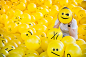 Ball.Room. / 2016 : I have created 65 different well-known as well as new emojis that have been put on 2015 yellow inflatable beach balls using 14 character sets of different typefaces. Then I filled up a room with these yellow balls.Every visitor can tak