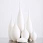 Lovely 7 piece white matte bottle collection by Sara Paloma.