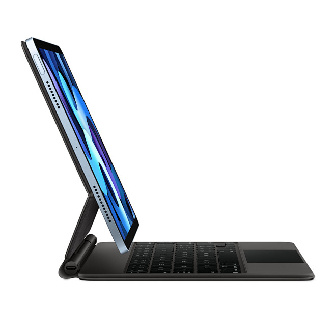 妙控键盘安装在 iPad 上的图片，展示...