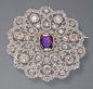 Exquisite platinum, 18k gold Edwardian brooch w/diamonds & amethyst.