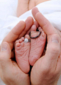 Baby feet with rings