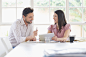 Hispanic business people talking at conference table by Gable Denims on 500px