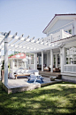 WOW! I love the nook to the back left, the pergola for shade (And hanging plants) and the cozy feel this deck has!: 