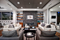 Example of a trendy formal and open concept dark wood floor living room design in Los Angeles with multicolored walls, a ribbon fireplace and a stone fireplace