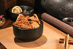 聚会下酒菜卤豆皮卤味小吃美食摄影图