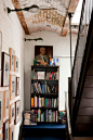 Landing / great little nook in the home of architect Diana Kellogg. photograph by David Giles. via Remodelista. #staircase #interiors #bookcase #new york city
