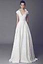 Off White Silk Zibeline gown covered with Lace, with high collar.  More info at: http://www.efr7.com/shop/the-bride/arome/#sthash.bxdFS15y.dpuf