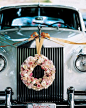 Nice vintage ride for the bride and groom to and from the wedding
粉色花圈~