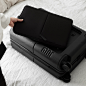 Carry On Pro Suitcase with Laptop Pocket : Our signature Carry On with a detachable SnapSleeve™ laptop compartment.  Coupled with the ejectable battery, this case is perfect for the tech-savvy traveller. Try it for 100 days.