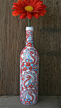 Hand Painted Wine bottle Vase, White with red, orange and blue accents, Vibrant Henna style design.