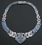 A FINE ART DECO DIAMOND AND AUAMARINE NECKLACE/TIARA, BY LACLOCHE FRERES  The front palmette panel with pavé-set diamond buckle shoulders to a three-row rectangular-cut aquamarine band and diamond and aquamarine backchain, circa 1930.@北坤人素材