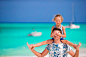 Happy family at tropical beach having fun by Dmitry Travnikov on 500px