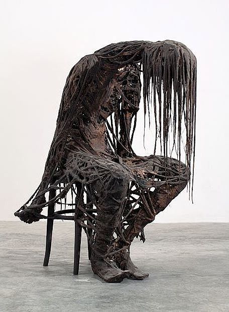 creepy sculpture Thi...