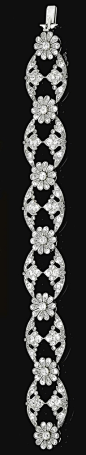 A bracelet of open work and floral design, millegrain set with rose-, single- and circular-cut diamonds, bracelet length approximately 170mm