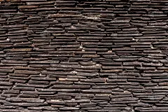 近景砖墙，现代黑色石材纹理背景。