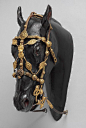 Tibetan Bridle  --  15th-17th Centuries  --  Leather, iron & gold  --  Metropolitan Museum of Art