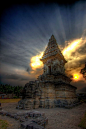 See the sunset behind Candi Jawi temple in Pandaan, East Java, Indonesia