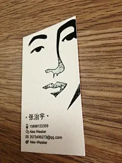 简单线条勾勒出传神的漫画头像运用在高档名片中是非常吸引眼球的名片