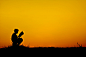 Silhouette a boy reading book at sky sunset by Sawitree LYaon on 500px