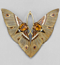 An Art Nouveau 'Moth' pendant, by Lucien Gaillard, circa 1900. Composed of gold, champlevé enamel, citrines and carved horn.: @北坤人素材