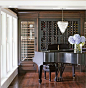 Wine & Music Room: a former dining room was converted into a wine and music room. Wine kept in walnut cubbies and two Sub-Zero wine chillers is easily accessible from both the dining room and the kitchen