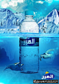 海报灵感 纯净水创意广告灵感 创意纯净水海报 蓝色风格纯净水广告 雪山和海洋元素纯净水海报图 