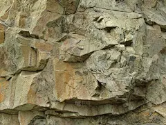 岩石背景。山的风景特写。垃圾红色石头背景。岩层纹理。山特写。