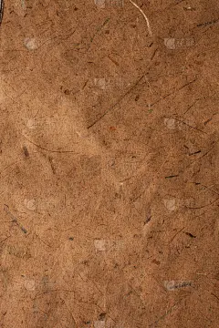 抽象赭色和橙色背景。赭色的纹理。近距离观察植物纤维质地。抽象的赭色和橙色背景和纹理为设计师。植物纤维
