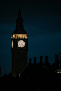 the big ben clock tower towering over the city of london