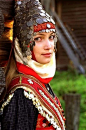 Chuvash woman. Chuvash people claim to be descendent from the Volga Bulgarians. Their traditional clothes are the same as Danube Bulgarian, yet they have adopted a turkic language as a result of invasians.: