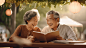 阳光下的老年人正在微笑着看书阅读投入学习书本知识教育文化世界读书日图片下载 - 觅知网