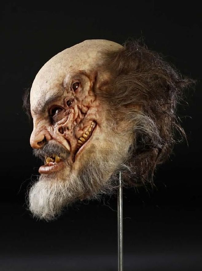 the devils advocate (1997) - beared demon head