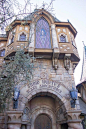 The evil Queen looks down from her chambers at Disneyland guests about to enter "Snow White's Scary Adventures" in Fantasyland. This is one of the original rides that still exists from Disneyland's opening in 1955, though it had a major update i