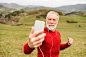 Active senior runner in nature taking selfie with smart phone. by Jozef Polc on 500px