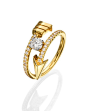 The FLOW collection ~ An 18k yellow gold arrow ring set with a diamond in the center, adorned with diamonds
